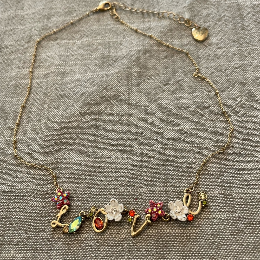 Vintage Betsey Johnson Gold and Pink Love Necklace with Nature-Inspired Charms